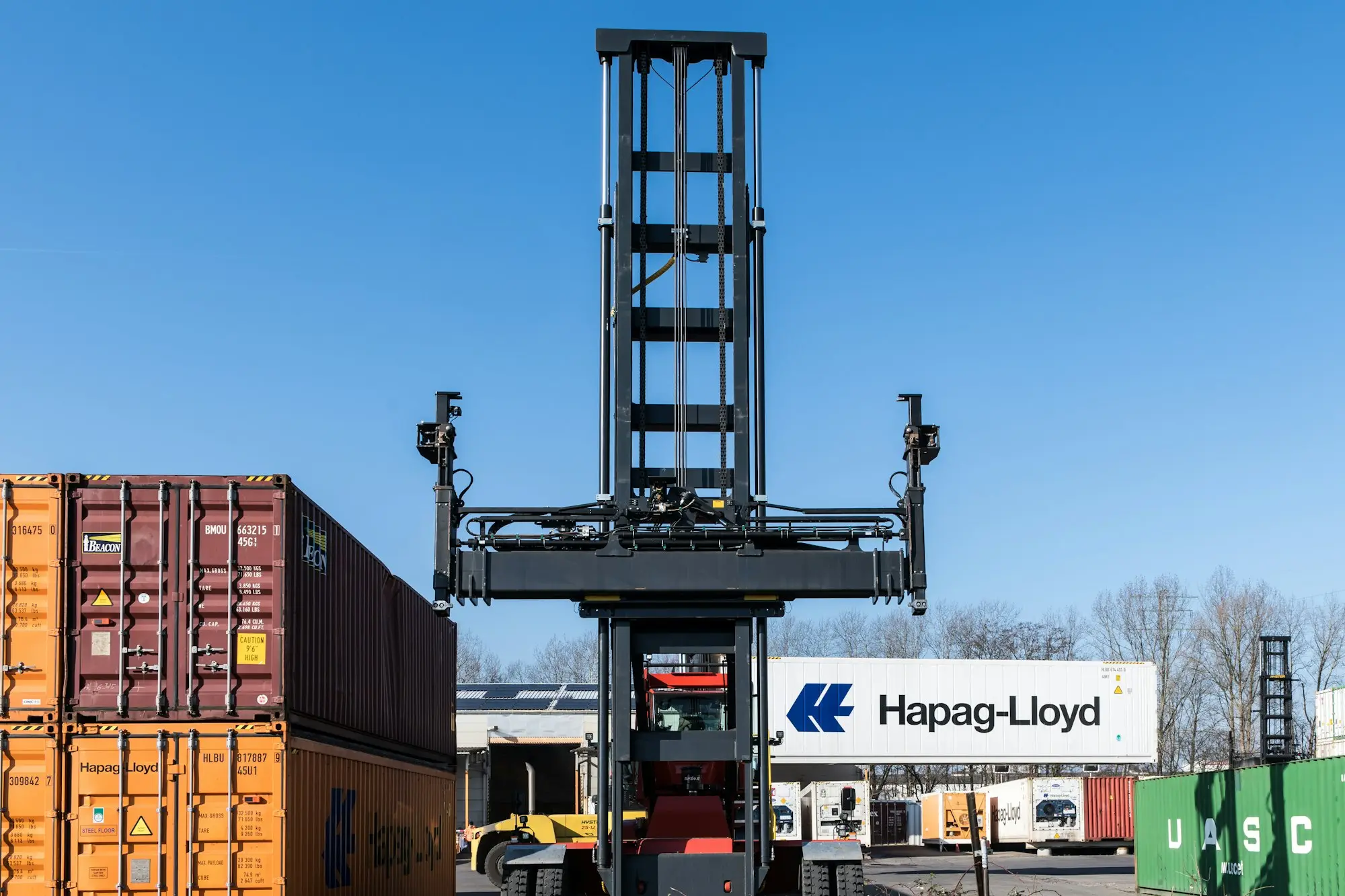 New forklift parked in a timber yard ready for work